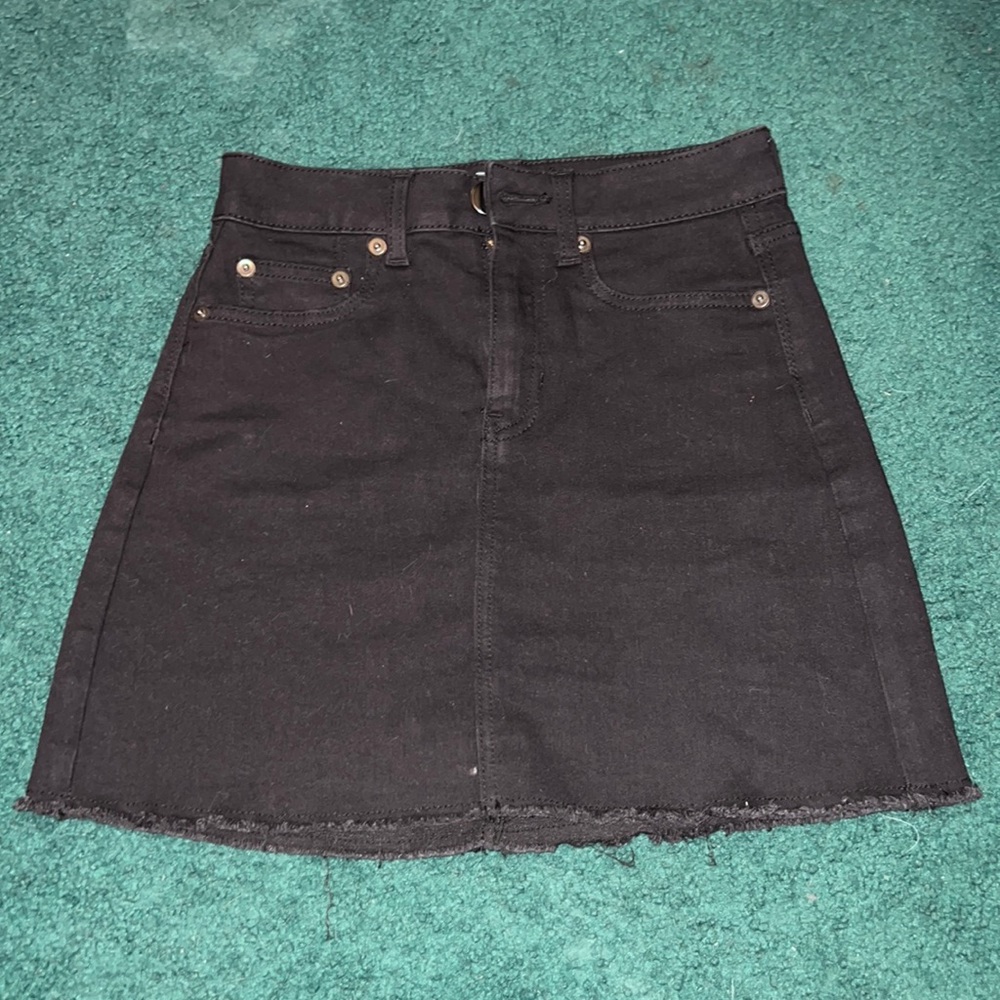 Mini black denim skirt